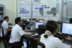Traitement des procédures administratives au siège du Quartier de Trân Hung Dao, ville de Nam Dinh, province de Nam Dinh. Photo: VNA