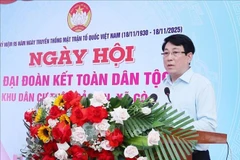 Le président de la République, Luong Cuong, s'exprime lors de Fête de la Grande Union nationale organisée au village de Bao An, commune de Go Noi, ville de Da Nang. Photo: VNA
