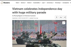L'agence britannique Reuters a qualifié cet événement de "célébration historique de grande envergure", soulignant l'effervescence patriotique dans les rues de Hanoï, décorées aux couleurs nationales. Reuters a également noté la présentation d'une exposition nationale des réalisations socio-économiques, soulignant l'esprit d'unité nationale et l'ambition de développement du pays. Photo: VNA