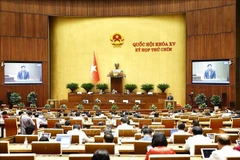 Une séance plénière de la 9e session de la 15e Assemblée nationale. Photo: VNA