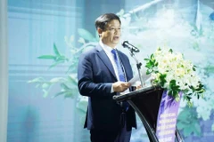 Nguyên Thanh Binh, vice-président permanent du Comité populaire de la ville de Huê, s'exprime lors de la conférence. Photo: VNA