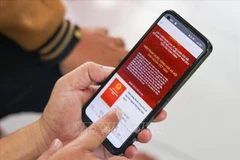 Au 26 mai 2025 à 20h00, plus de 17 100 600 citoyens avaient exprimé leurs avis sur la révision de certains articles de la Constitution de 2013 via l’application VNeID. Photo: VNA