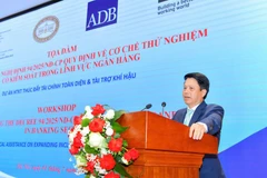Le vice-gouverneur de la Banque d'État, Pham Tiên Dung, s'exprime lors du séminaire. Photo: VietnamPlus