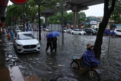 De fortes pluies provoquent les inondations à Hanoi. Photo: VNA