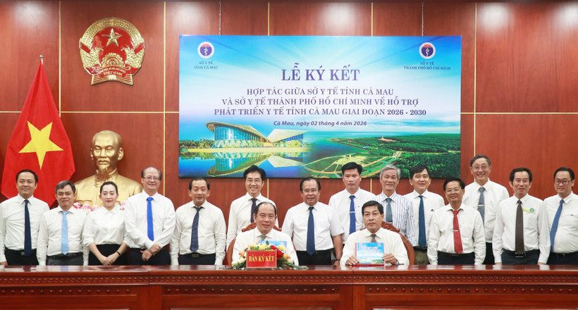 Lors de la cérémonie de singature. Photo : VNA