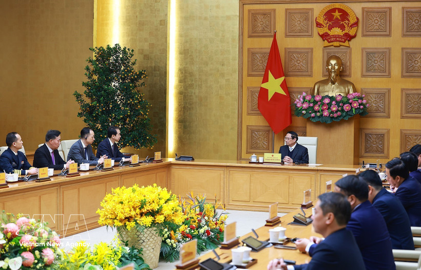 Le Premier ministre Pham Minh Chinh reçoit l'ambassadeur de Chine au Vietnam, He Wei. Photo : VNA