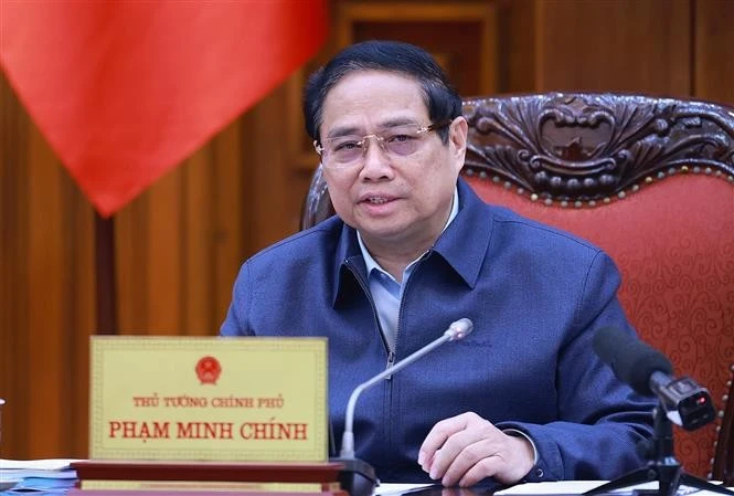 Le Premier ministre Pham Minh Chinh lors de la réunion. Photo: VNA