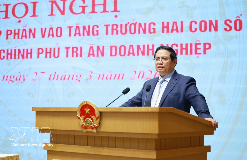 Le Premier ministre Pham Minh Chinh s’exprime lors de la conférence. Photo : VNA