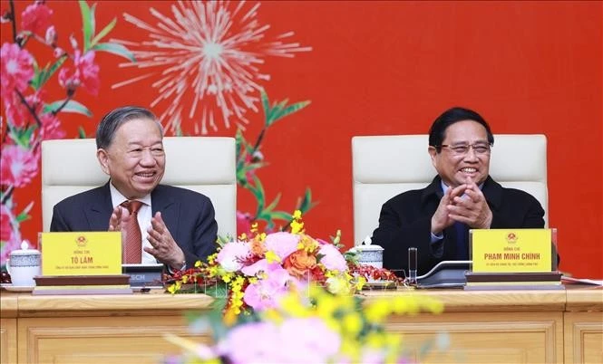 Le secrétaire général To Lam et le Premier ministre Pham Minh Chinh lors de la rencontre. Photo : VNA