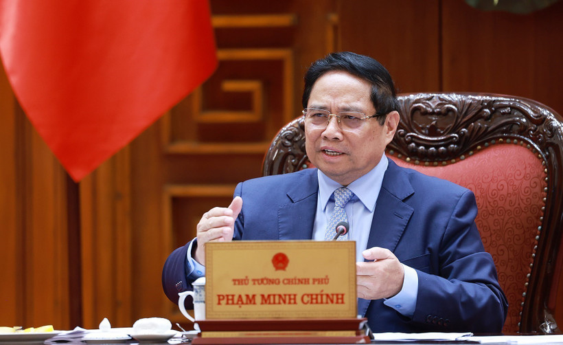 Le Premier ministre Pham Minh Chinh s'exprime lors de la réunion. Photo: VNA