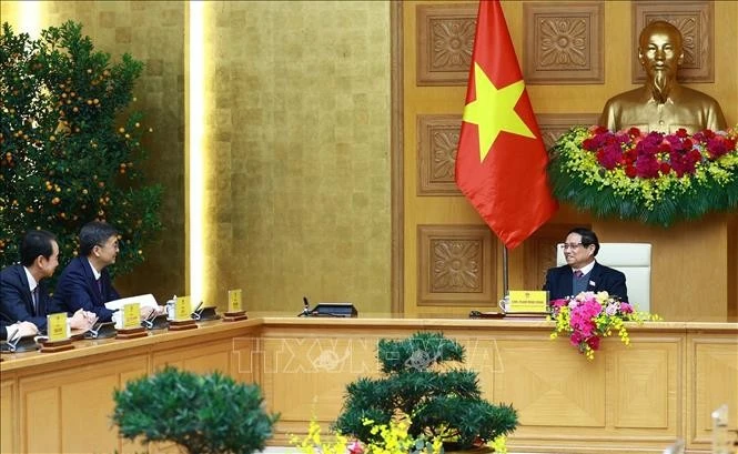 Le Premier ministre Pham Minh Chinh reçoit Chen Gang, membre du Comité central du Parti communiste chinois (PCC), secrétaire du Comité du PCC et président du Comité permanent de l'Assemblée populaire de la région autonome Zhuang du Guangxi, Chine. Photo: VNA