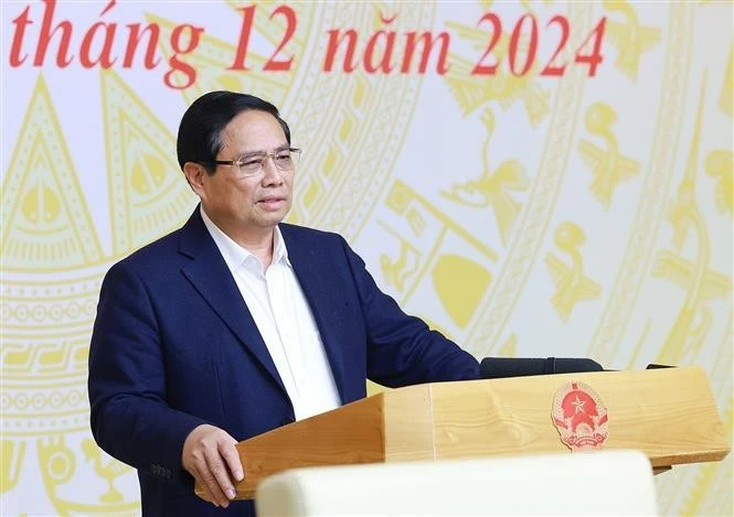 Le Premier ministre Pham Minh Chinh prend la parole lors de l'événement. Photo: VNA