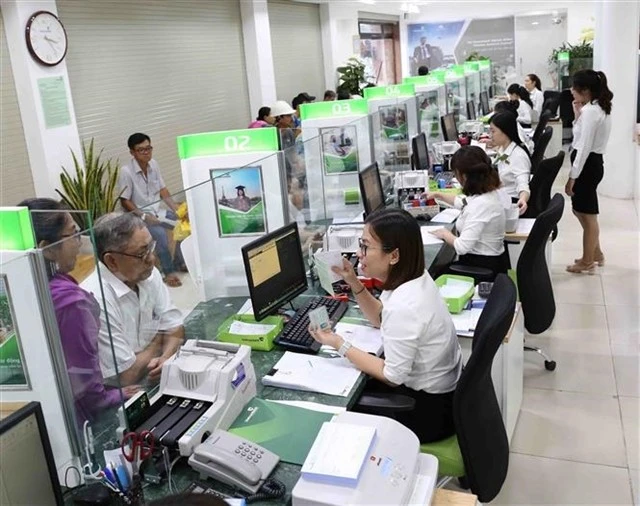 Le chiffre d'affaires du marché et le bénéfice après impôts ont augmenté respectivement d'environ 20,1 % et 50,8 % en glissement annuel. Photo: VNA