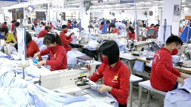 Malgré une forte demande intérieure, de nombreux entreprises du textile et de l'habillement peinent à étendre leur présence et à revendiquer une plus grande part du marché local. Photo : moit.gov.vn