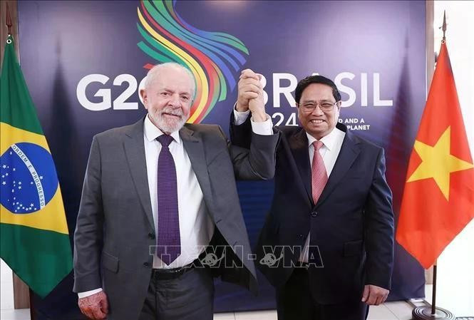 Le Premier ministre Pham Minh Chinh (à droite) et le président brésilien Luiz Inácio Lula da Silva. Photo: VNA