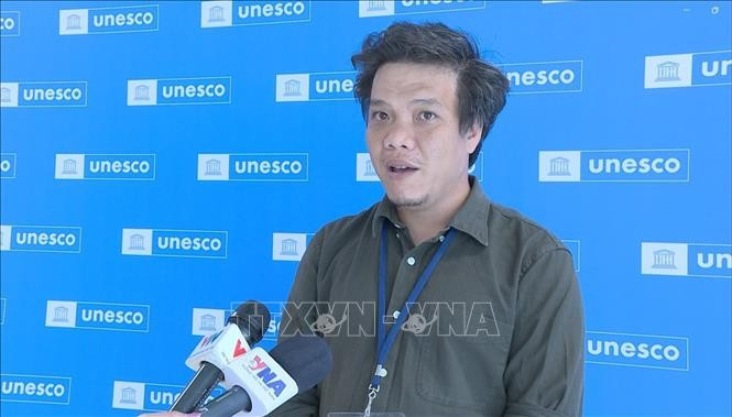 Dinh Duc Hoàng, directeur général adjoint du Centre d’information de l’UNESCO (UNET) au micro de la VNA. Photo : VNA