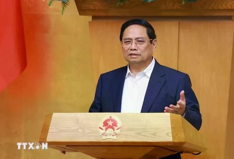 Le Premier ministre Pham Minh Chinh s'adresse à la réunion ordinaire du gouvernement le 4 juin. Photo : VNA