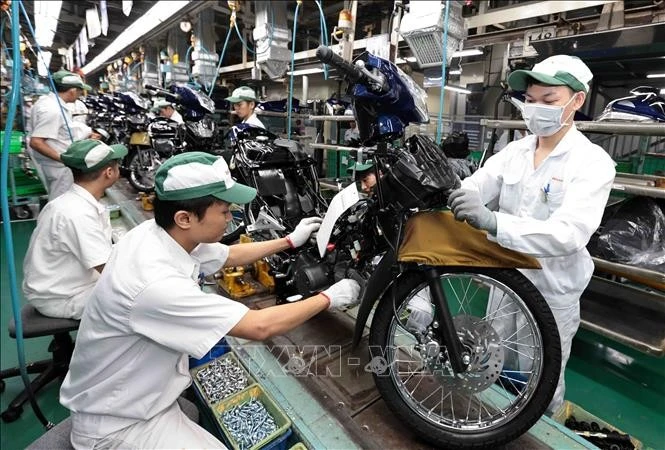 Une chaîne de production de moto de l'usine Honda Phuc Yên, dans la province de Vinh Phuc. Photo: VNA