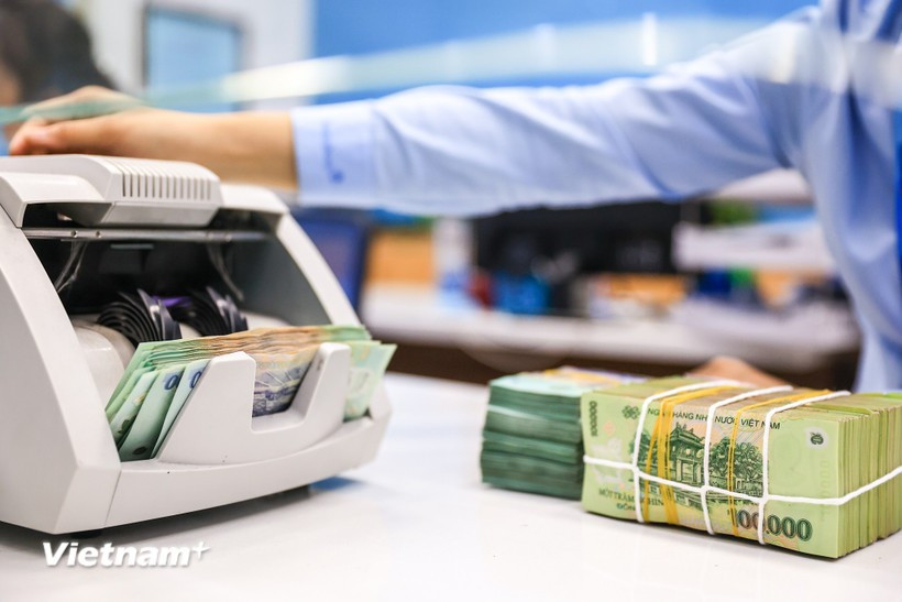 Au 28 juillet, le total des prêts en cours a augmenté de 9,64 % par rapport à la fin de l'année dernière. Photo: VietnamPlus