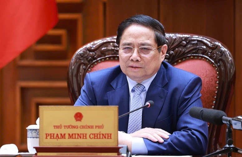 Le Premier ministre Pham Minh Chinh lors de la réunion, à Hanoi, le 28 juin. Photo : VGP