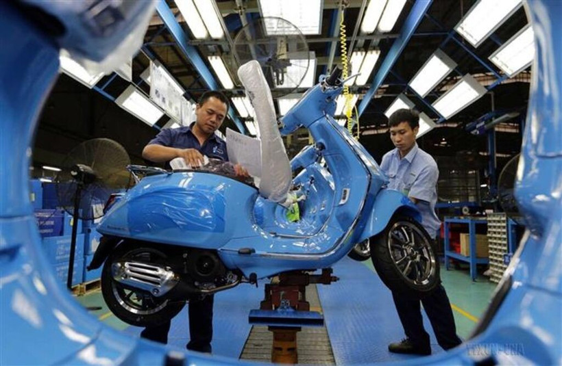 Dans l'usine de fabrication des scooters de la Sarl Piaggio, une entreprise à 100% capital d'investissement italien, basée à Vinh Phuc, dans la province de Phu Tho (Nord). Photo : VNA