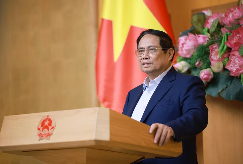 Le Premier ministre Pham Minh Chinh lors de la réunion, à Hanoi, le 9 juillet. Photo : VNA