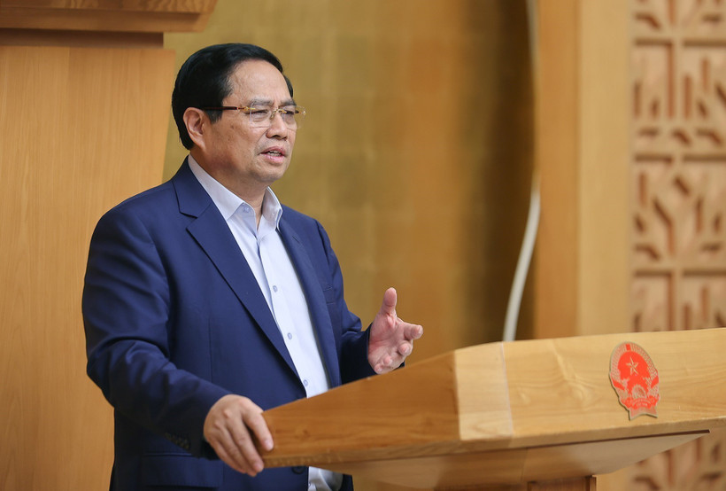 Le Premier ministre Pham Minh Chinh s’exprime lors de la réunion, à Hanoi, le 23 août. Photo : VNA