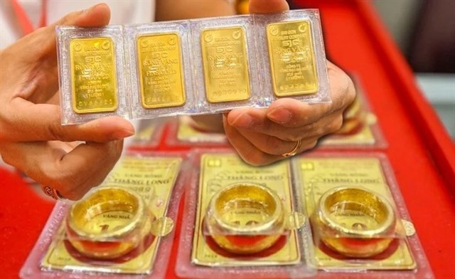 En fonction des objectifs de la politique monétaire, de l'offre et de la demande d'or, des réserves nationales de change et des performances commerciales réelles, la SBV déterminera un quota d'importation annuel total pour le pays (si cela est jugé nécessaire). Photo: VNA