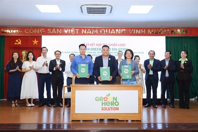 Des délégués assistent à la cérémonie de signature lors du lancement du projet Green Hero Solution à Hô Chi Minh-Ville, le 12 mars. Photo : Organisateurs