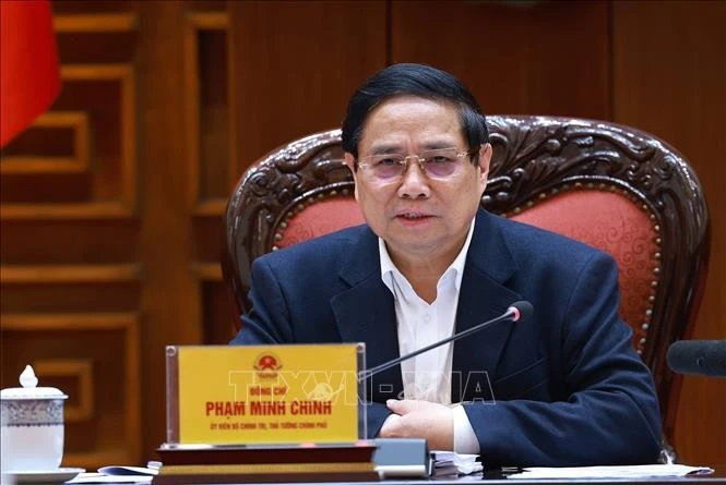 Le Premier ministre Pham Minh Chinh lors de la conférence de la permance du Comité du Parti du gouvernement, à Hanoi, le 9 mars. Photo: VNA