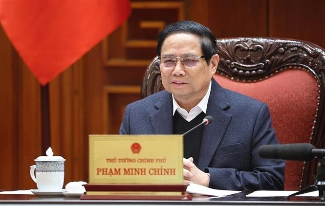 Le Premier ministre Pham Minh Chinh lors de la réunion, à Hanoi, le 10 février. Photo: VNA