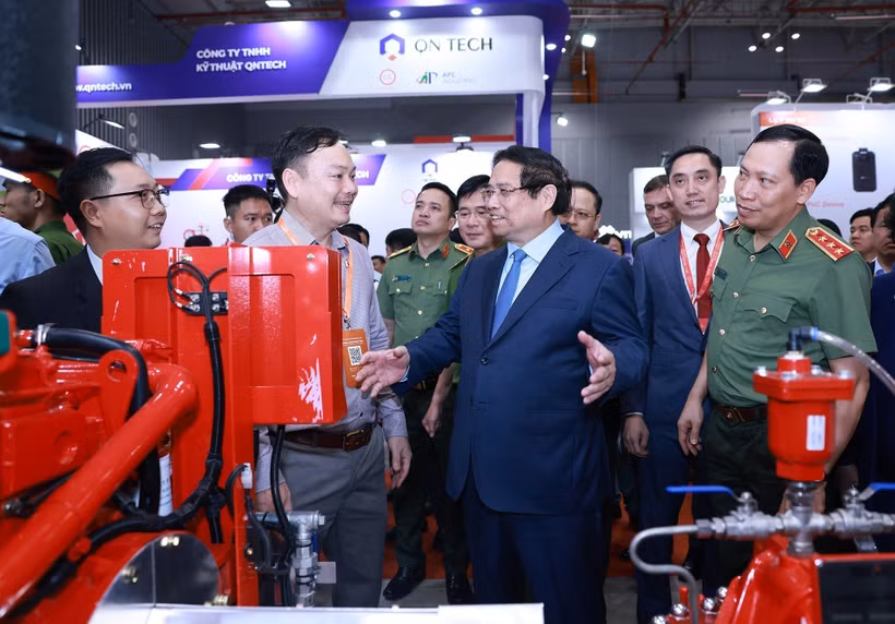 Le Premier ministre Pham Minh Chinh lors du salon professionnel de la sécurité Secutech+ Vietnam, à Hô Chi Minh-Ville, le 14 août. Photo : VNA