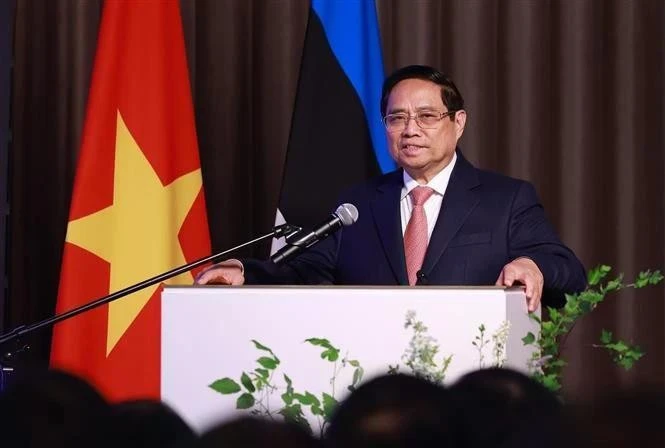 Le Premier ministre Pham Minh Chinh s’exprime lors du Forum des affaires Vietnam-Estonie. Photo : VNA