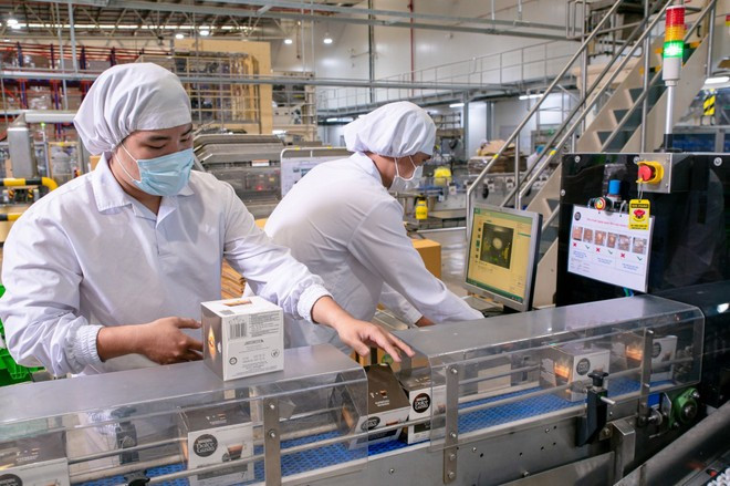 Sur la base de ces analyses, le Dr Nguyen Quoc Viet estime qu'un taux de croissance du PIB de 6,5 % est réalisable grâce à un certain nombre de moteurs de croissance favorables. Photo: Vietnamplus nestle-viet-nam-1.jpg
