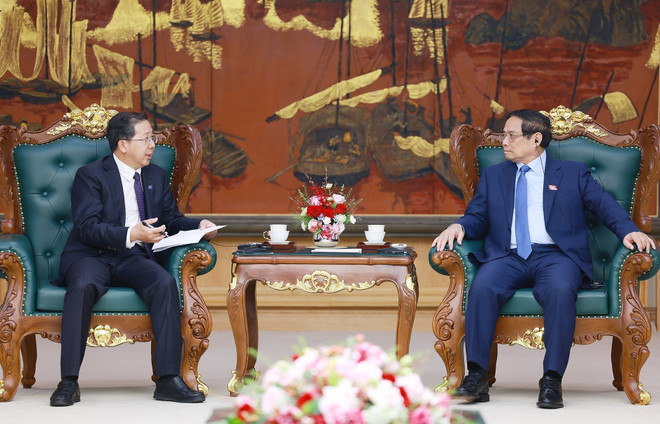 Le Premier ministre Pham Minh Chinh a invité China Huadian Corporation à intensifier ses investissements dans les projets d’énergie verte au Vietnam. Photo: VNA vna-potal-thu-tuong-tiep-chu-tich-cong-ty-huu-han-tap-doan-khoa-hoc-ky-thuat-hoa-dien-trung-quoc-cho-phat-8031305.jpg