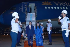 Le Premier ministre Pham Minh Chinh, son épouse Lê Thi Bich Trân et une délégation vietnamienne de haut rang ont atterri tôt le 5 juillet (heure locale) à l'aéroport Galeão de Rio de Janeiro tôt le 5 juillet (heure locale), entamant ainsi leur participation au sommet élargi des BRICS et aux activités bilatérales au Brésil. Photo : VNA