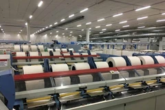 Une usine textile de Bảo Lân produisant des fibres, du fil et du tissu cotonnés à partir de feuilles d'ananas. Photo courtoisie de l'entreprise