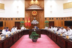 Le Premier ministre Pham Minh Chinh souligne la nécessité de réorganiser les services publics conformément aux orientations du Parti et aux exigences pratiques. Photo : VNA