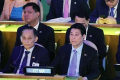 Le président Luong Cuong et le ministre des Affaires étrangères par intérim Le Hoai Trung assistent à la réunion de haut niveau pour célébrer le 80e anniversaire de la fondation des Nations Unies. Photo / VNA