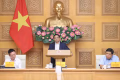 Le Premier ministre Pham Minh Chinh lors de la séance de travail avec le Conseil consultatif politique. Photo : VNA