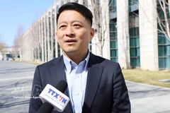 Le professeur Qu Qiang, commentateur de la chaîne de télévision chinoise CGTN et enseignant à l’Université centrale des nationalités de Chine. Photo / VNA