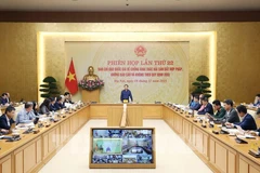 Lors de la réunion. Photo : VNA