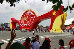 Visite de l'exposition nationale des réalisations, intitulée « 80 ans d'indépendance, de liberté et de bonheur », au Centre des expositions du Vietnam à Hanoï. (Photo : VNA)