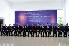 Des délégués vietnamiens et chinois assistent au séminaire. (Photo : VNA)