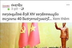 L’éditorial intitulé « Le 14e Congrès du Parti communiste du Vietnam, jalon des 40 ans du Renouveau », publié par le journal Pasaxon, organe du Parti populaire révolutionnaire lao. Photo / VNA