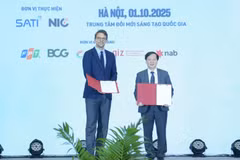 Echange d'un accord portant sur le déploiement du projet « Énergie propre, abordable et sûre pour l’Asie du Sud-Est – mise en œuvre au Vietnam » (CASE Vietnam). Photo . VNA