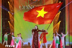 Un numero artistique au programme de concert « Le Vietnam en moi ». Photo : VNA
