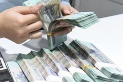 Plus de 959 milliards de dôngs de l'emprunt seront affectés au solde budgétaire de l'État. Photo baochinhphu.vn. 