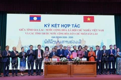 Lors de la cérémonie de signature. Photo : VNA