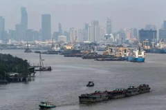 Des cargos naviguent près d'un port de Bangkok, en Thaïlande. (Photo : Reuters)